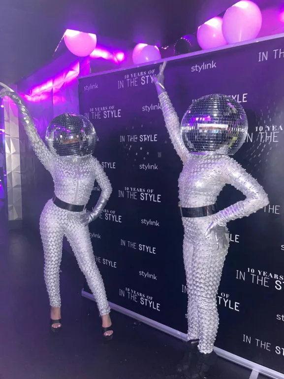 disco ball head dancers